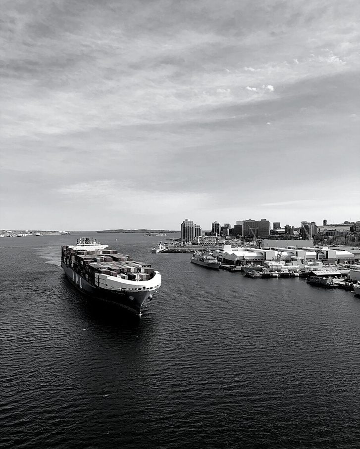 Container ship arriving in port with a cargo of toys imported from China