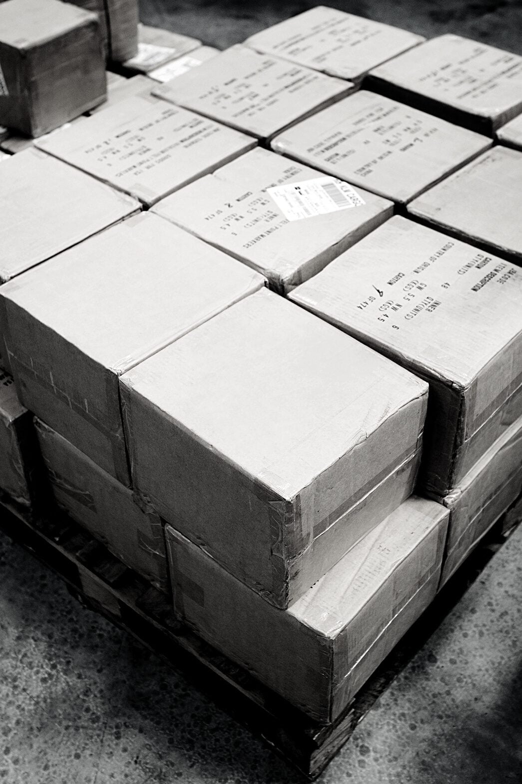Furniture cartons stacked on pallets for packing control before shipment