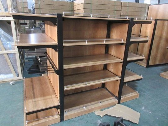 Wood and metal multi-tier display shelf checked in a Chinese factory